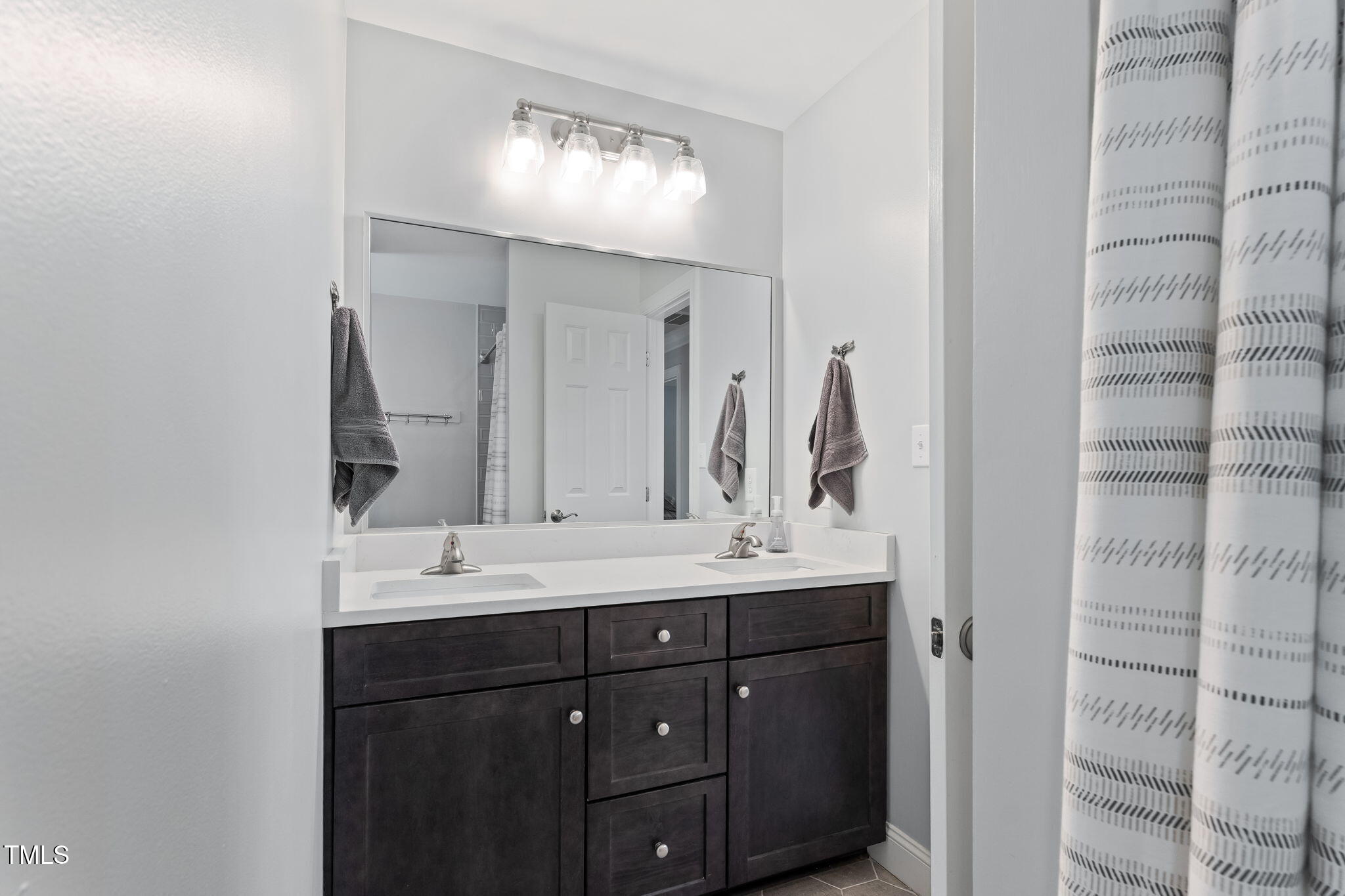 4513 Touchstone Forest Road Raleigh, NC 27612 - Photo 34 of 79 Dual Vanity in upstairs bathroom