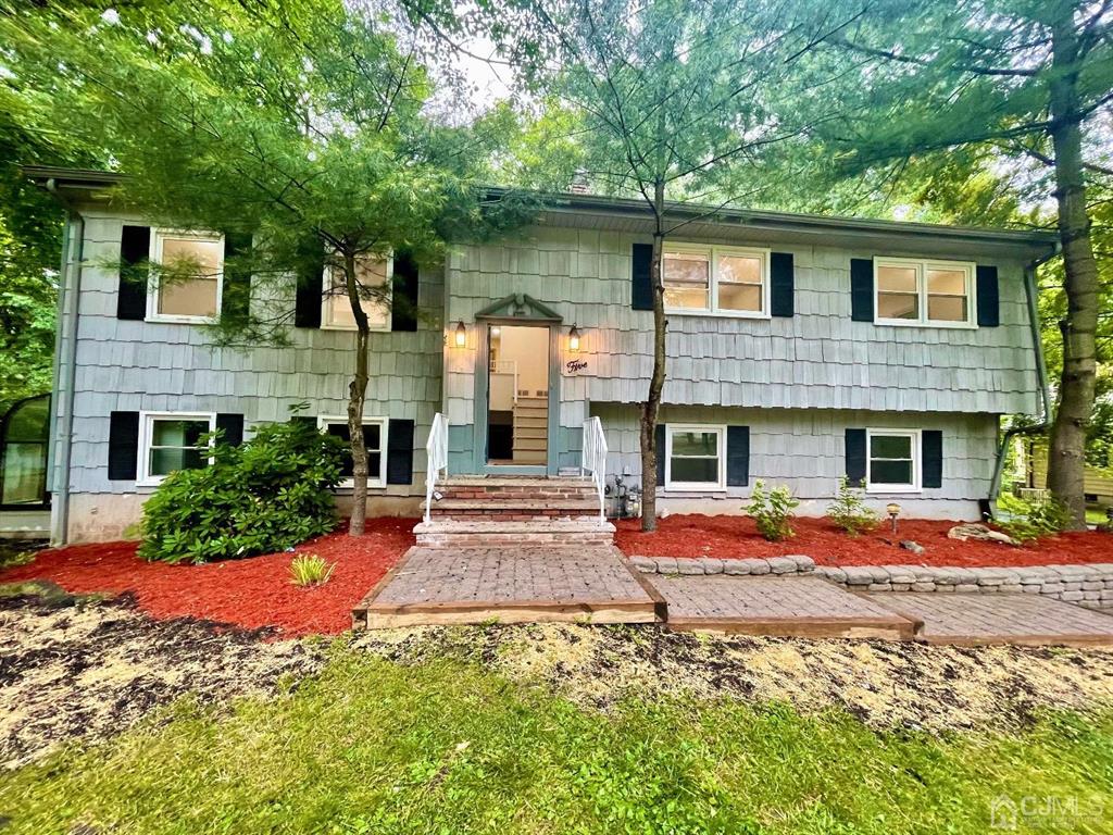 5 Greenwich Road Edison, NJ 08820 - Photo 1 of 52 a front view of a house with yard