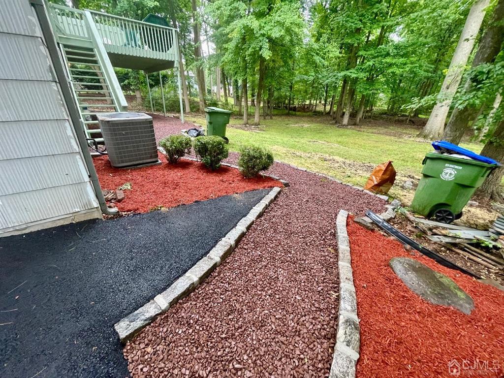 5 Greenwich Road Edison, NJ 08820 - Photo 43 of 52 a view of a backyard with sitting area