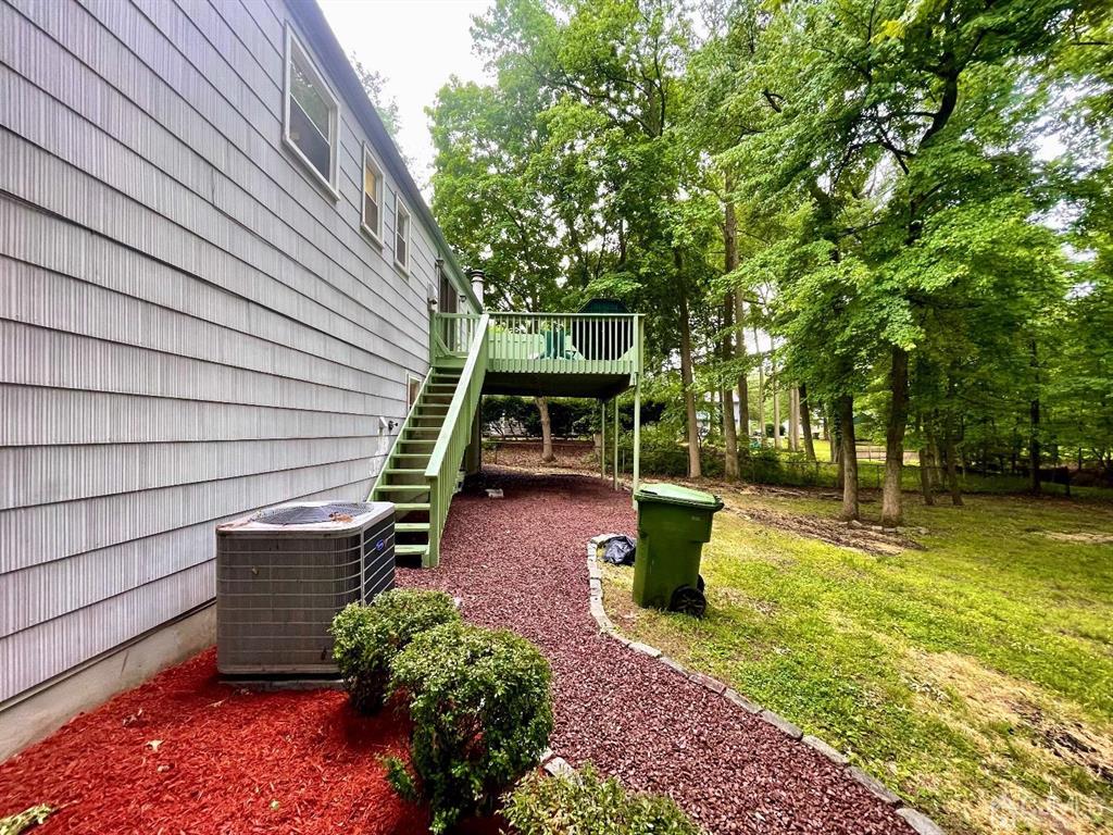5 Greenwich Road Edison, NJ 08820 - Photo 44 of 52 a view of a backyard with swimming pool