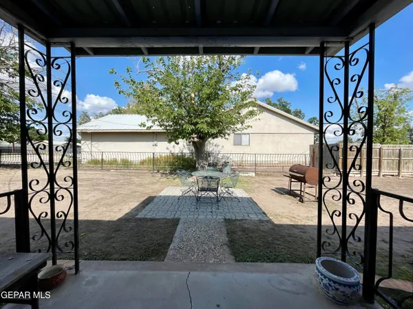 a view of a porch with seating space