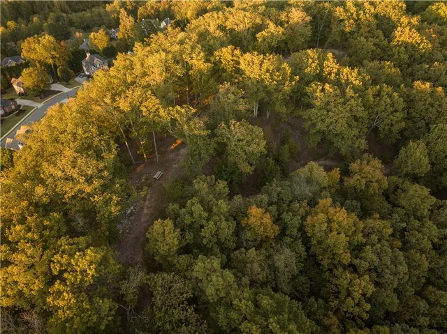 a view of a patio with a table and chairs