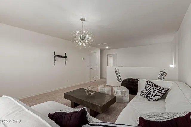 a bedroom with a bed and a bathroom