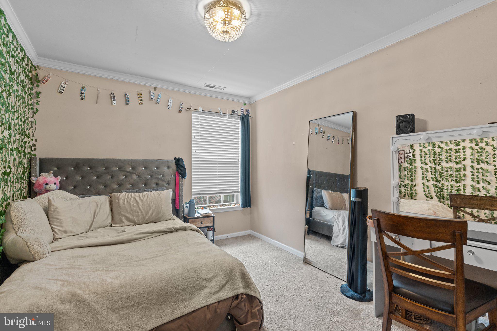 2404 Brookhaven Drive, Unit 330 Yardley, PA 19067 - Photo 12 of 27 a bedroom with a bed and a window