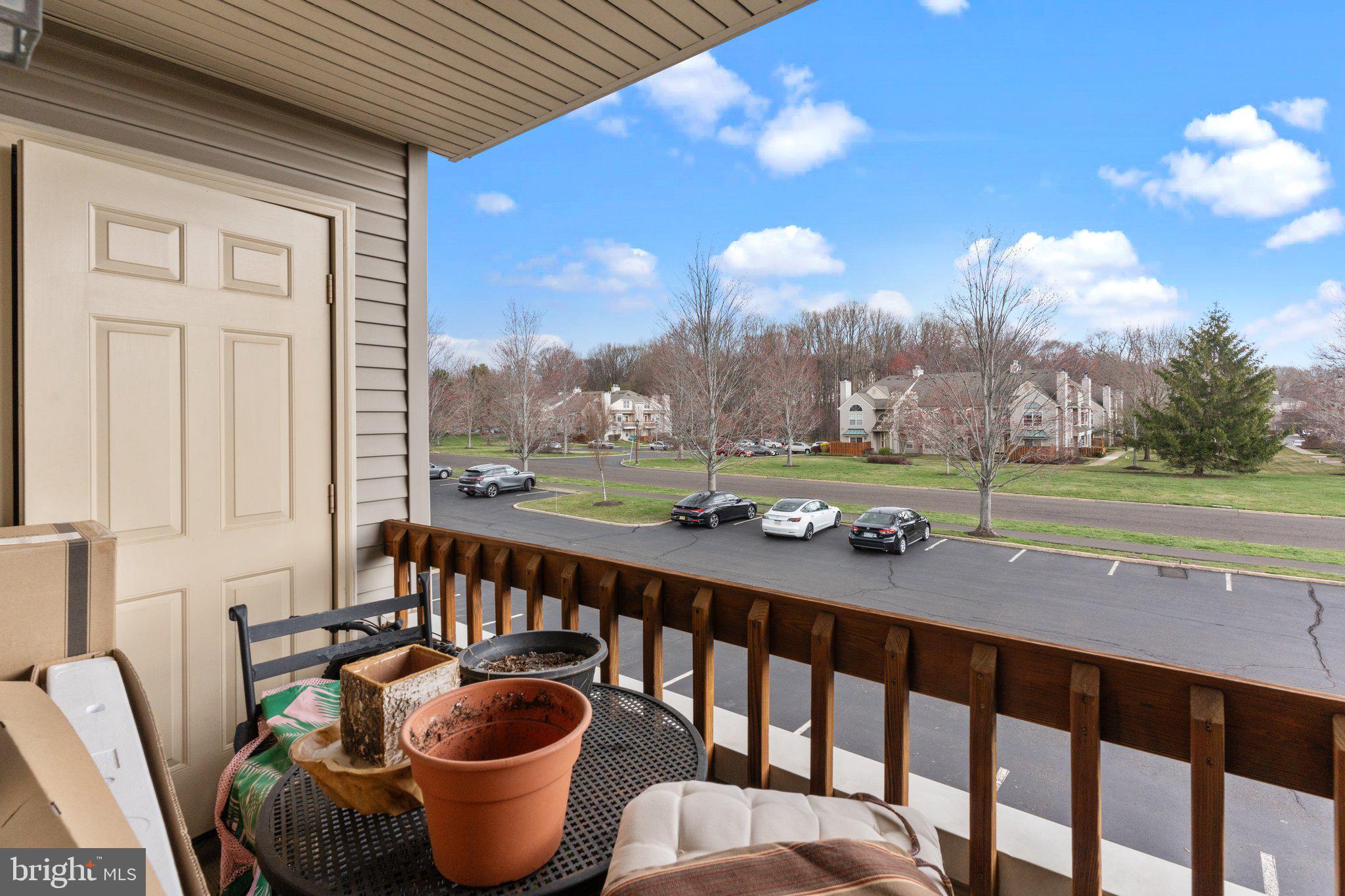 2404 Brookhaven Drive, Unit 330 Yardley, PA 19067 - Photo 22 of 27 a view of balcony with furniture and garden