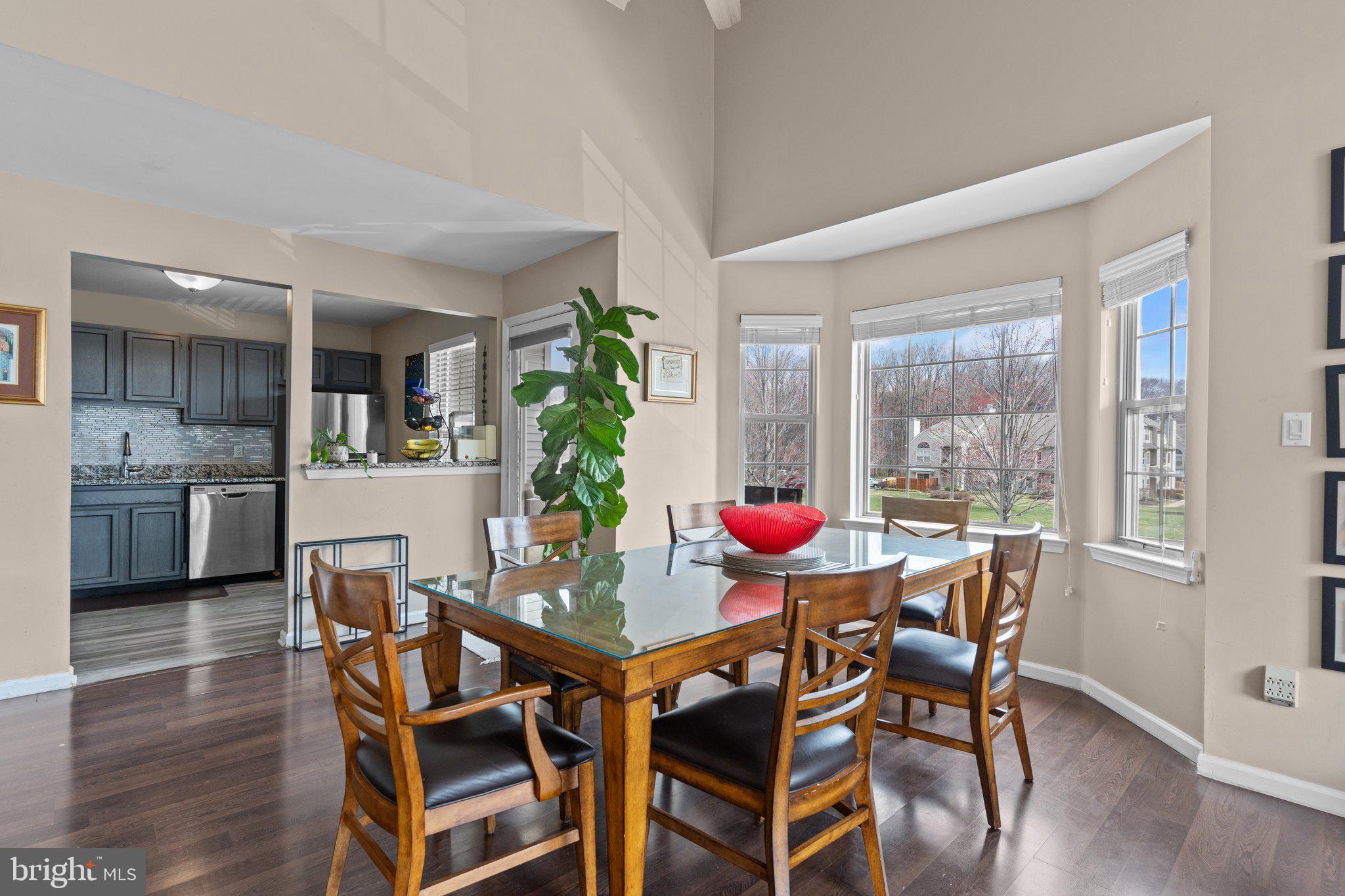 2404 Brookhaven Drive, Unit 330 Yardley, PA 19067 - Photo 5 of 27 a view of a dining room with furniture and wooden floor