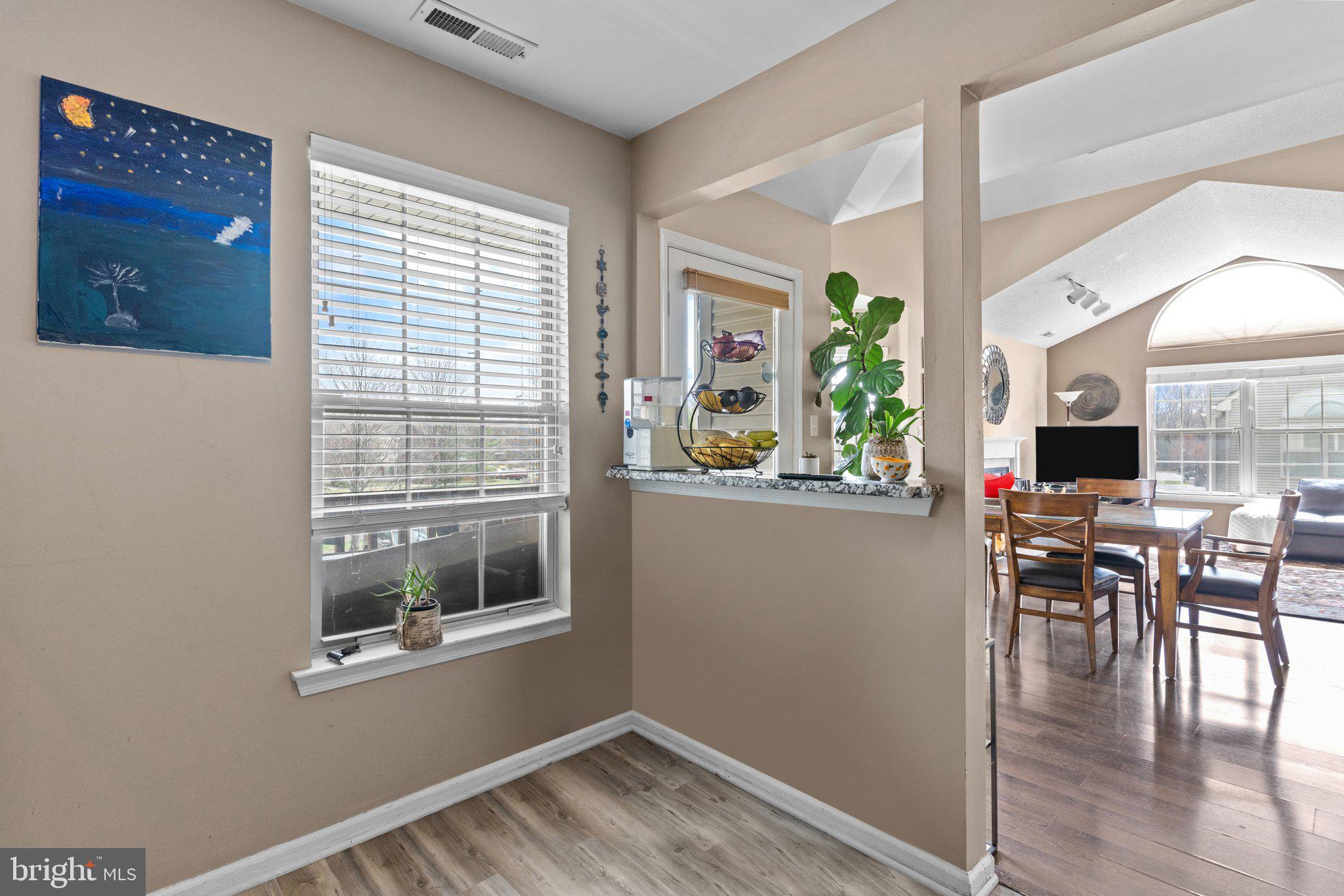 2404 Brookhaven Drive, Unit 330 Yardley, PA 19067 - Photo 7 of 27 a view of a dining room with furniture and window