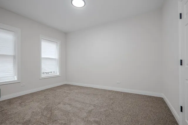 a bathroom with a shower sink and a bathtub