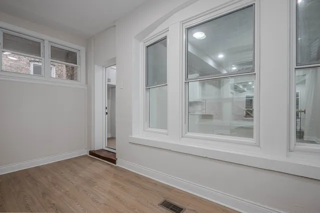 an empty room with windows