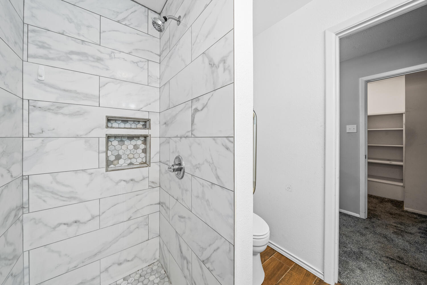 2028 Rice Drive Levelland, TX 79336 - Photo 17 of 25 a bathroom with a shower