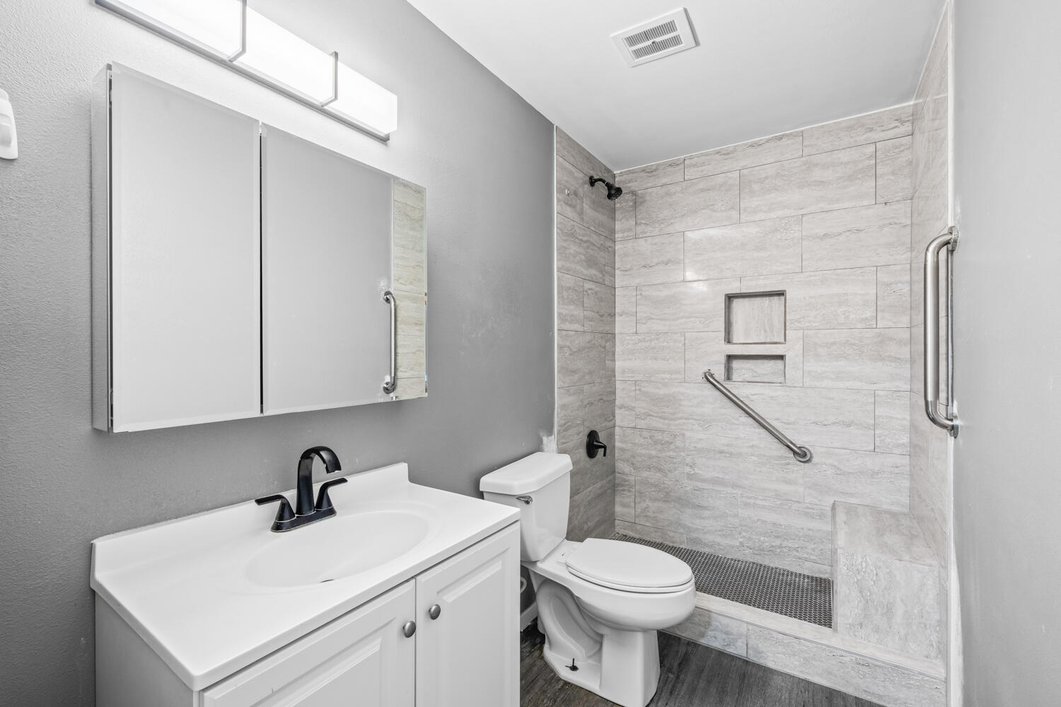 2028 Rice Drive Levelland, TX 79336 - Photo 20 of 25 a bathroom with a sink toilet and shower