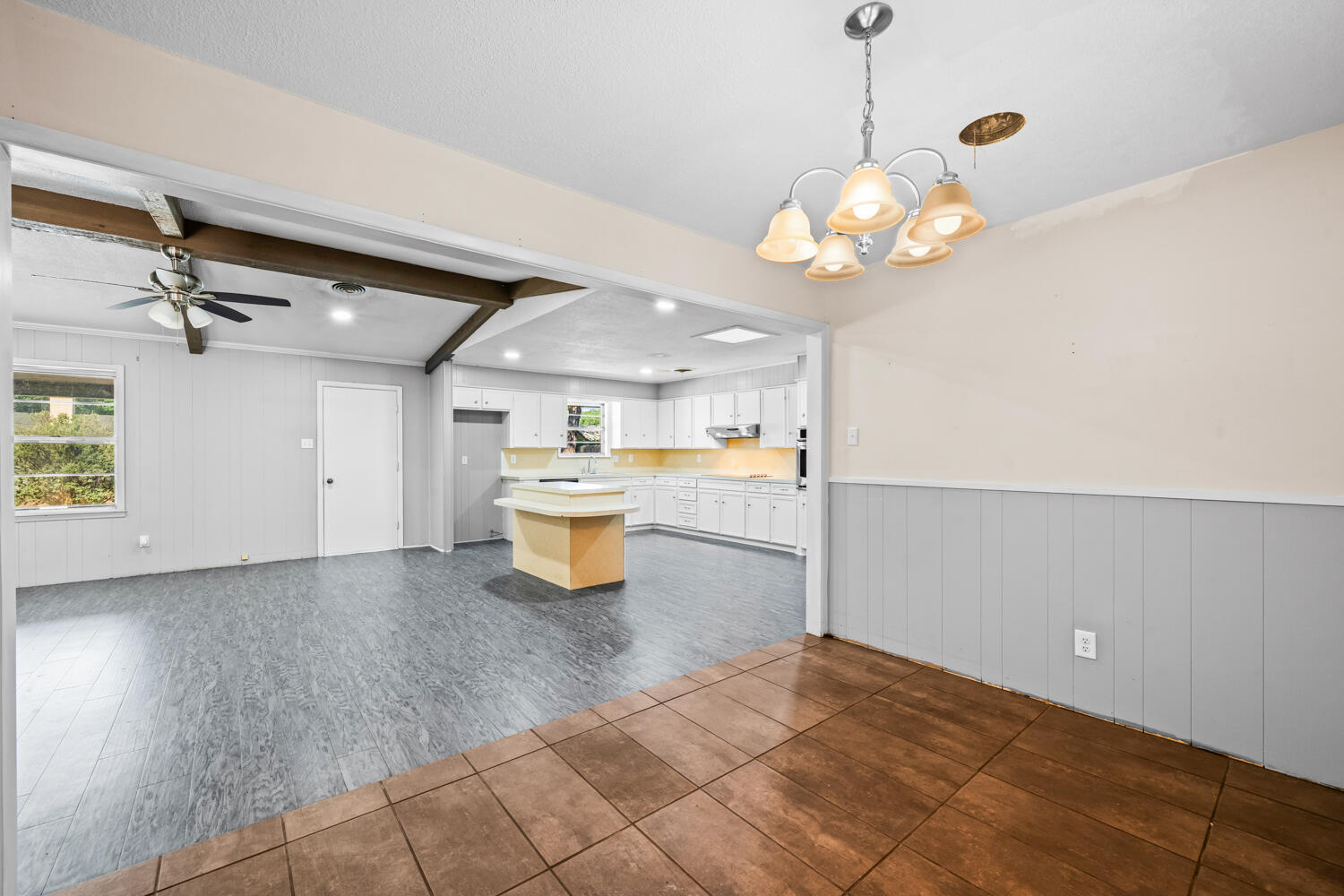 2028 Rice Drive Levelland, TX 79336 - Photo 5 of 25 a view of a room with a flat screen tv and kitchen view