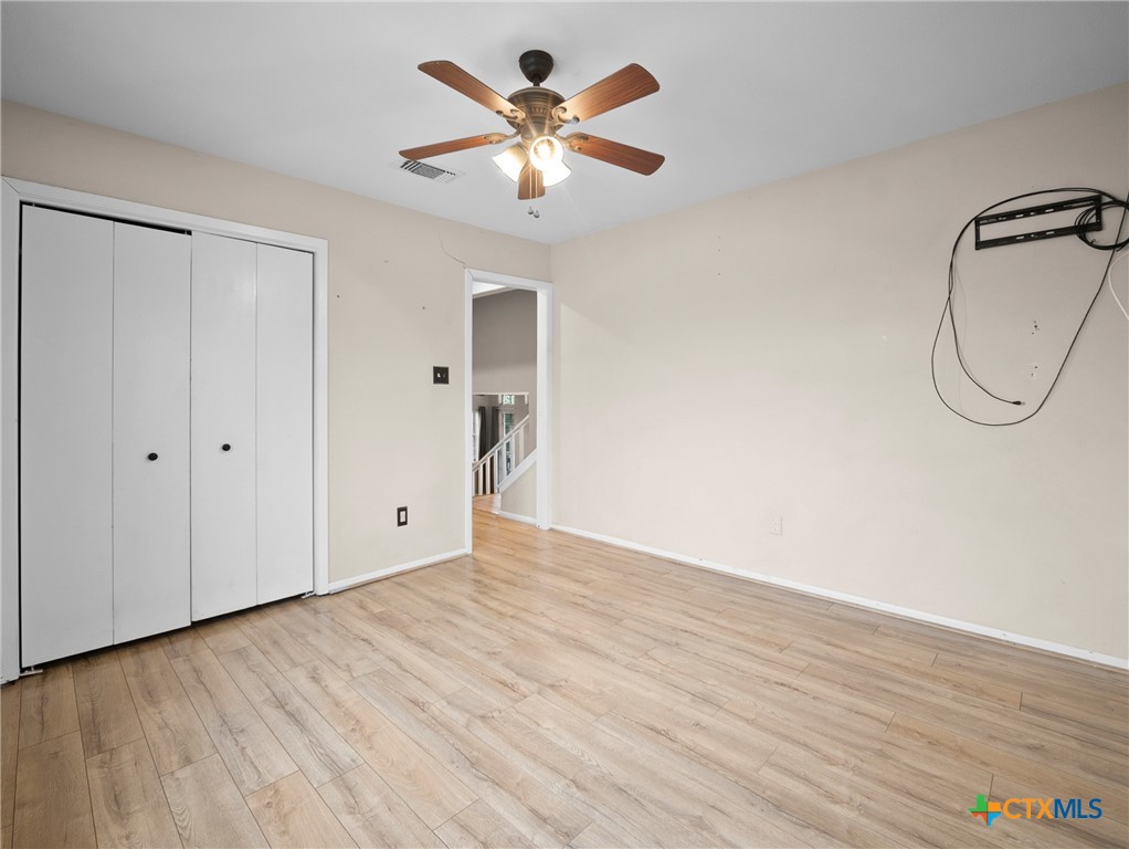 140 Engelmann Lane Seguin, TX 78155 - Photo 29 of 38 a view of an empty room with wooden floor