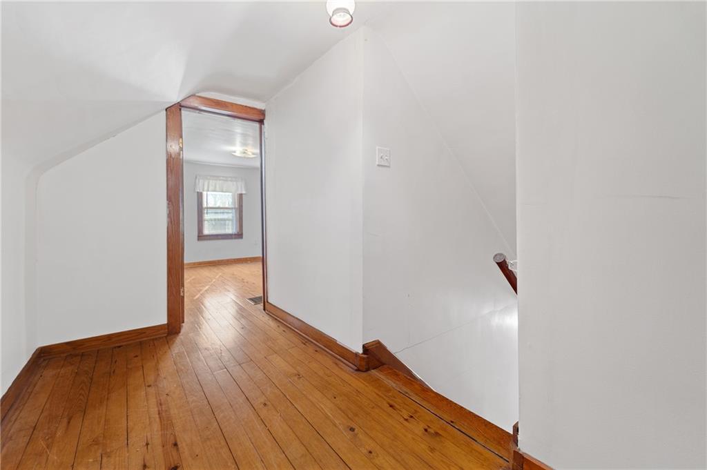 338 Brownlee Road Eighty Four, PA 15330 - Photo 14 of 29 a view of a room with wooden floor and front door