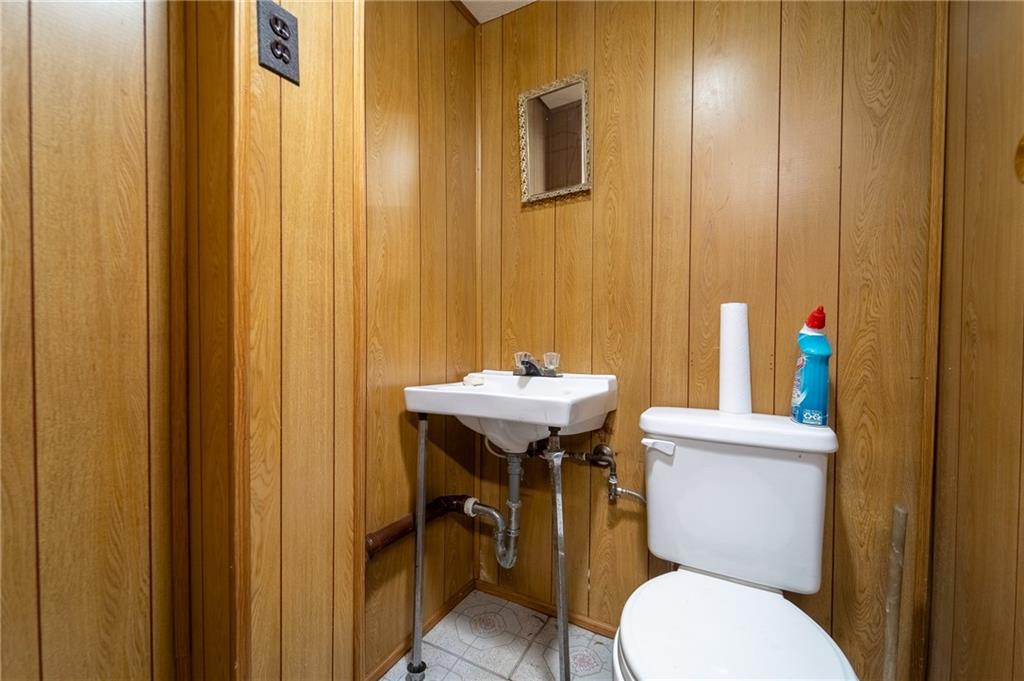 338 Brownlee Road Eighty Four, PA 15330 - Photo 22 of 29 a bathroom with a sink a toilet and shower curtain