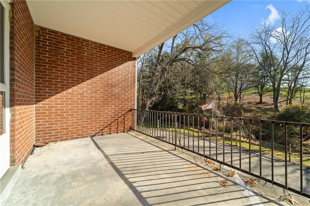 338 Brownlee Road Eighty Four, PA 15330 - Photo 24 of 29 a view of balcony with wooden floor and fence