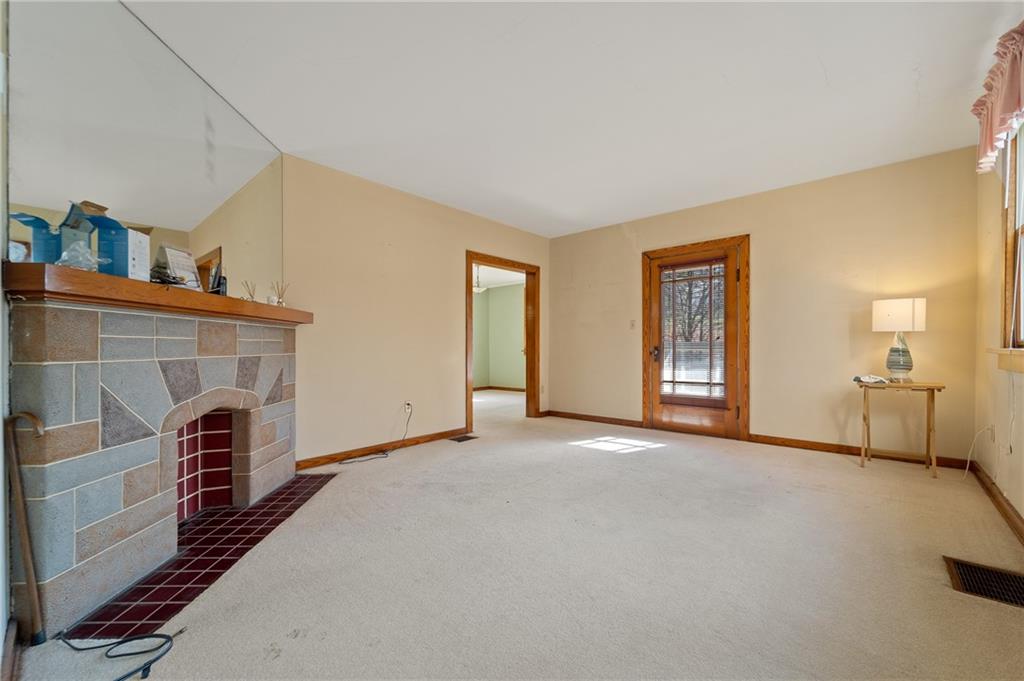 338 Brownlee Road Eighty Four, PA 15330 - Photo 4 of 29 a view of a livingroom with furniture and a fireplace