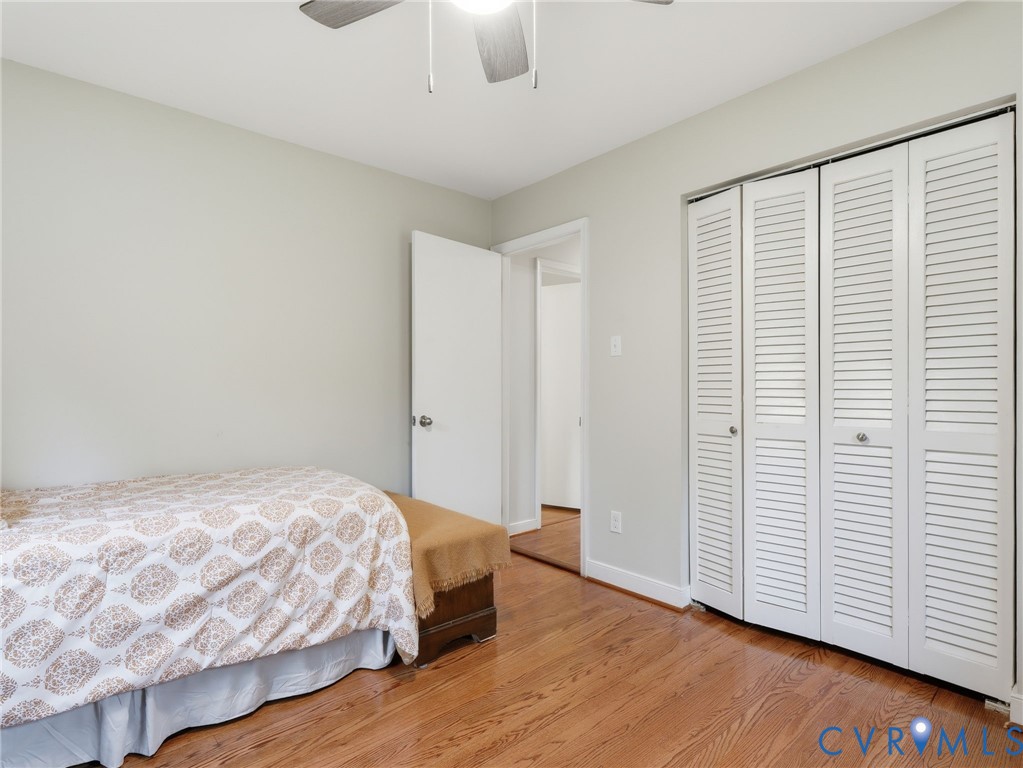 7707 Woodbrook Road Quinton, VA 23141 - Photo 26 of 42 Wood-finish flooring with white baseboards
