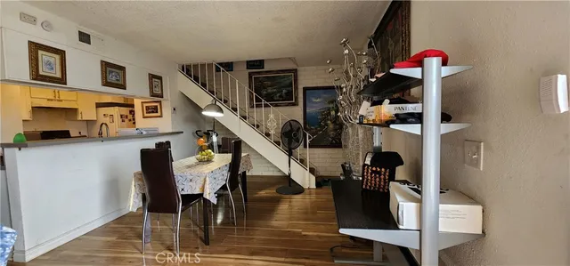 a view of a workspace with furniture