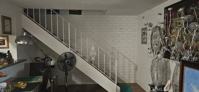 a front view of a house with outdoor seating