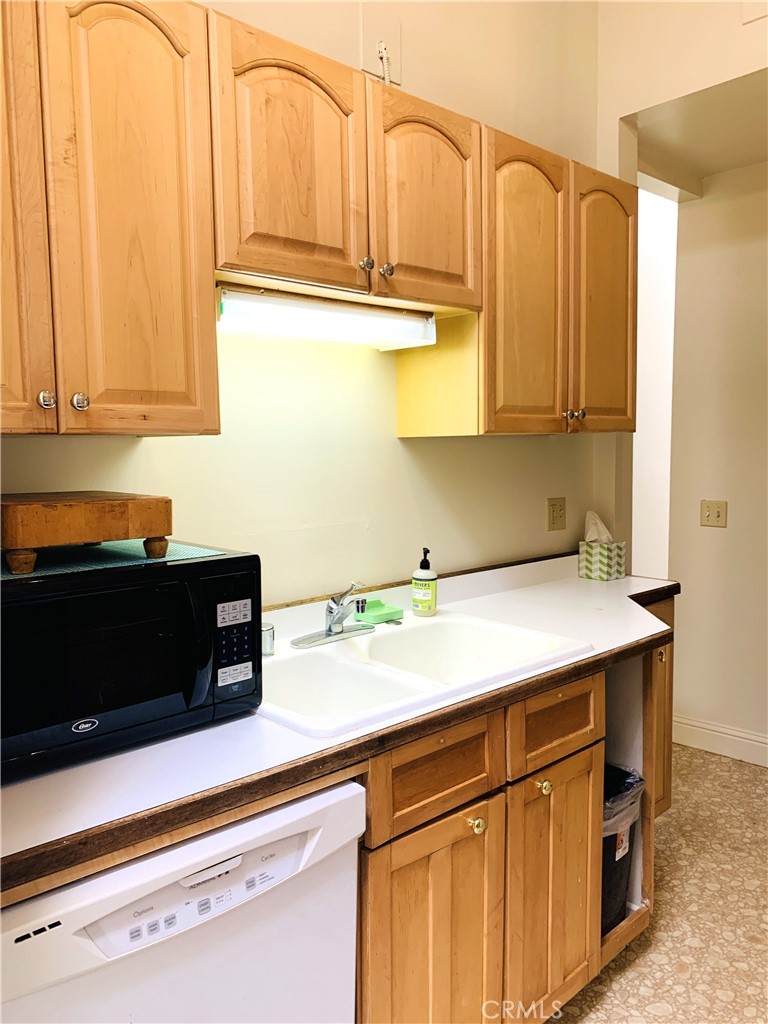 641 Main Street Red Bluff, CA 96080 - Photo 17 of 24 a kitchen with stainless steel appliances a cabinets and a counter top space