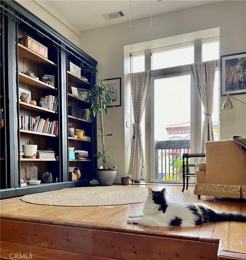 641 Main Street Red Bluff, CA 96080 - Photo 19 of 24 a living room with fish tank and a bookshelf