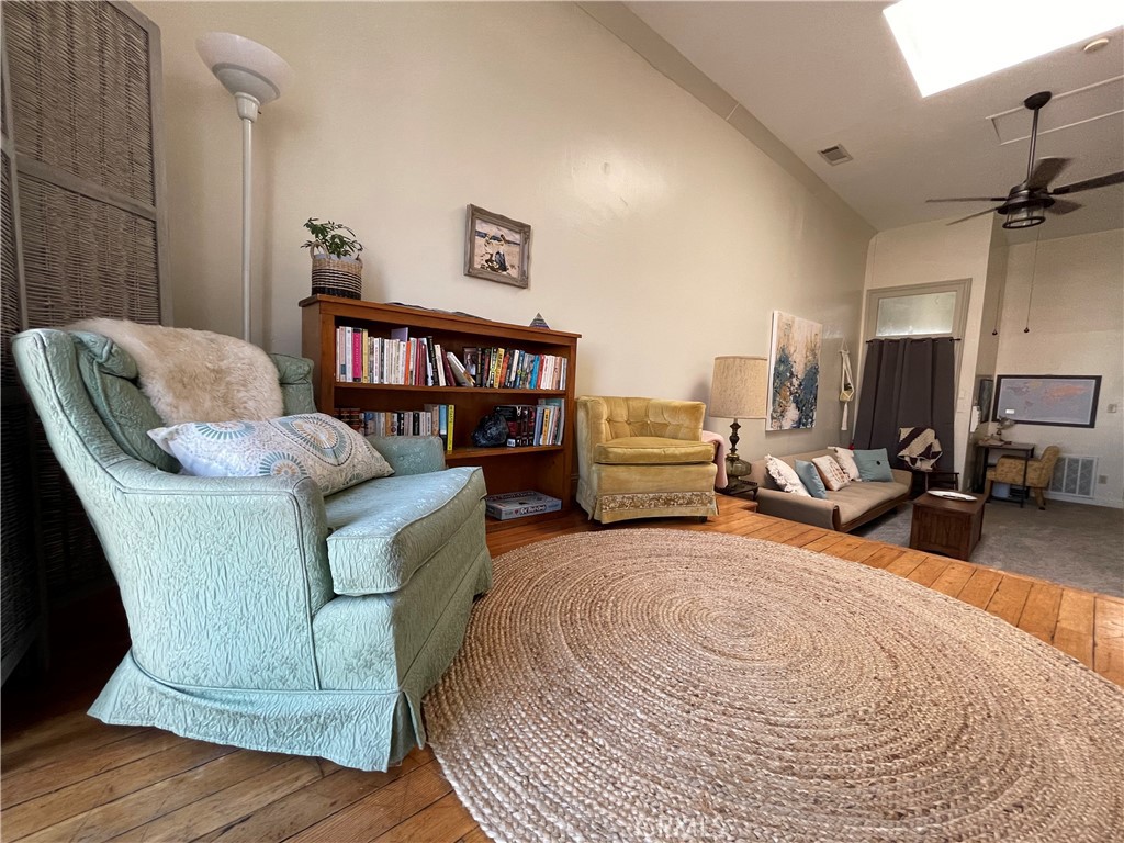 641 Main Street Red Bluff, CA 96080 - Photo 22 of 24 a bedroom with furniture and a wooden floor