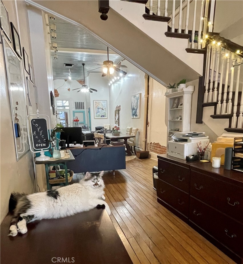 641 Main Street Red Bluff, CA 96080 - Photo 5 of 24 a living room with lots of furniture and a chandelier