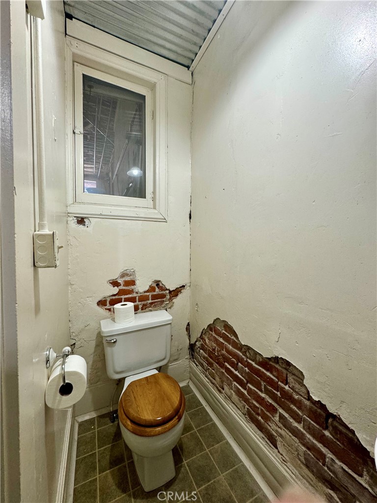 641 Main Street Red Bluff, CA 96080 - Photo 8 of 24 a bathroom with a toilet and a sink