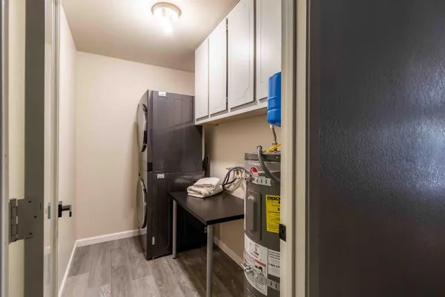 a kitchen with appliances and cabinets