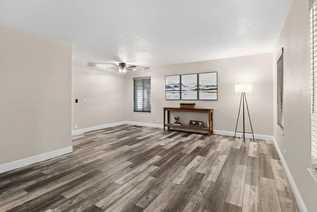 a room with a bed and a chandelier