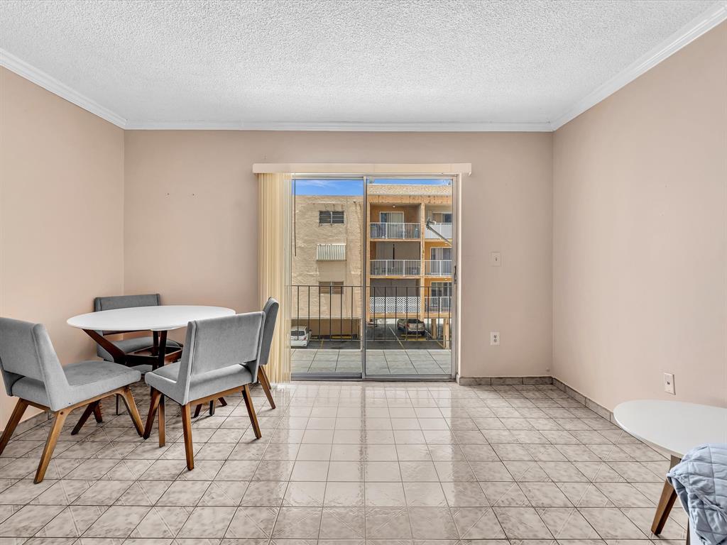 1075 West 68th Street, Unit 203 Hialeah, FL 33014 - Photo 18 of 41 a view of a livingroom with furniture