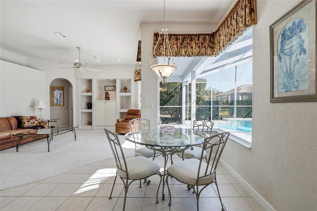 3521 Conifer Loop Spring Hill, FL 34609 - Photo 16 of 71 a view of a livingroom with furniture window and outside view