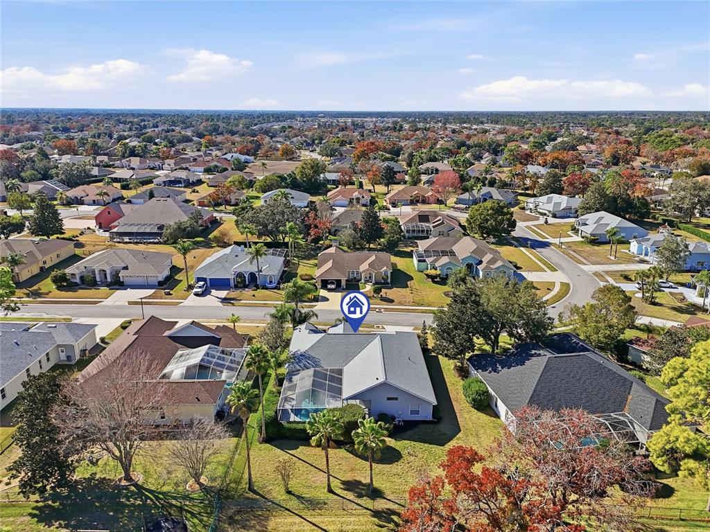 3521 Conifer Loop Spring Hill, FL 34609 - Photo 61 of 71 an aerial view of residential houses with outdoor space