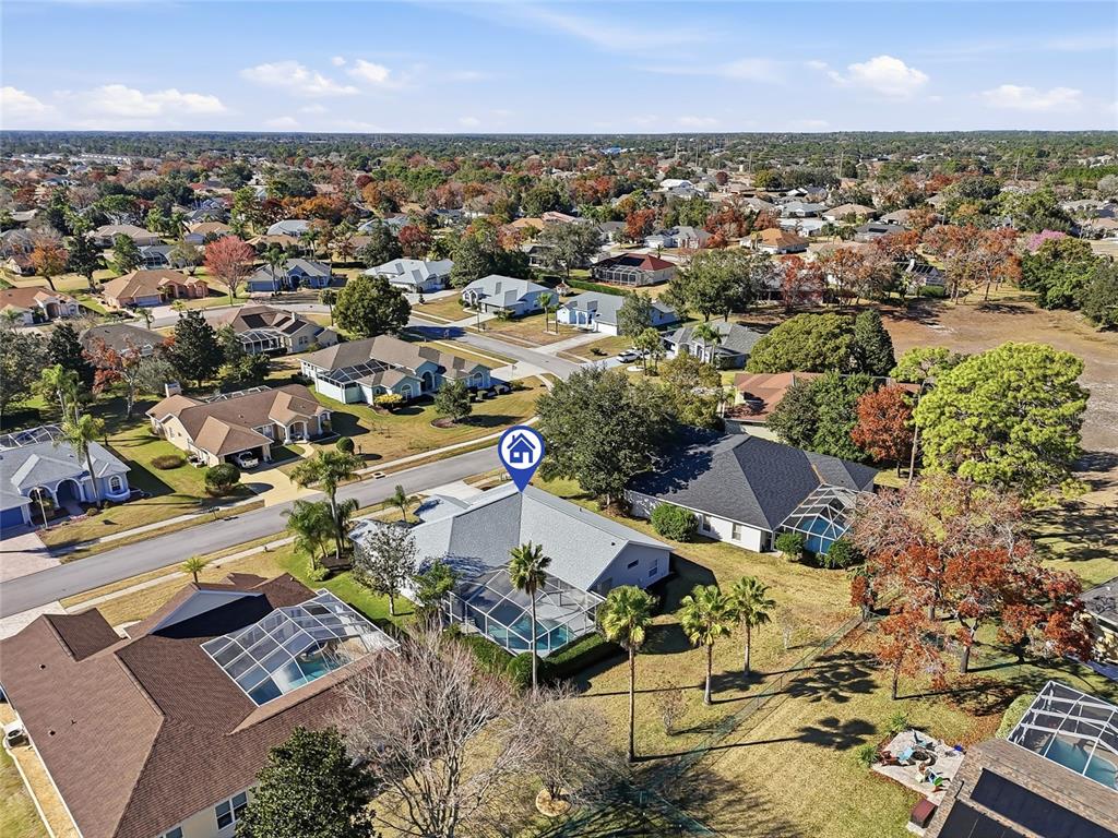 3521 Conifer Loop Spring Hill, FL 34609 - Photo 62 of 71 an aerial view of residential houses with outdoor space