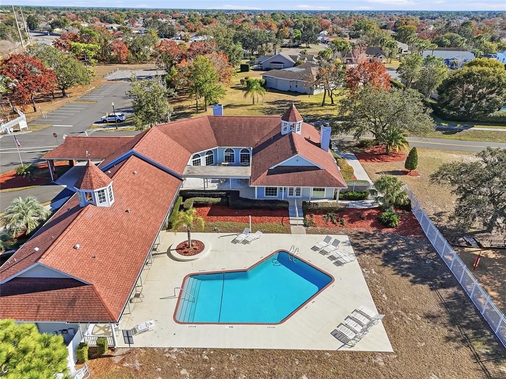 3521 Conifer Loop Spring Hill, FL 34609 - Photo 67 of 71 an aerial view of a house with garden space and lake view