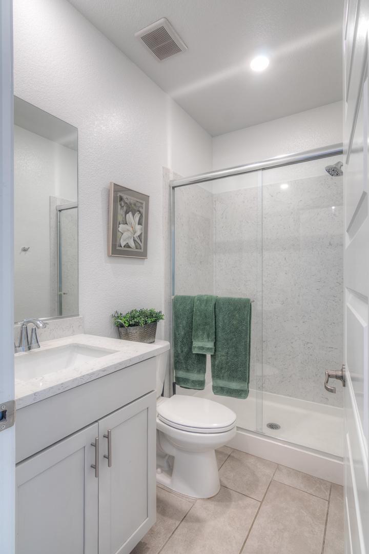 2116 Abbeyhill Road Lincoln, CA 95648 - Photo 17 of 46 a bathroom with a sink a toilet and shower