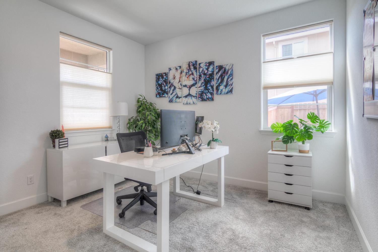 2116 Abbeyhill Road Lincoln, CA 95648 - Photo 18 of 46 a view of a workspace with furniture and a potted plant
