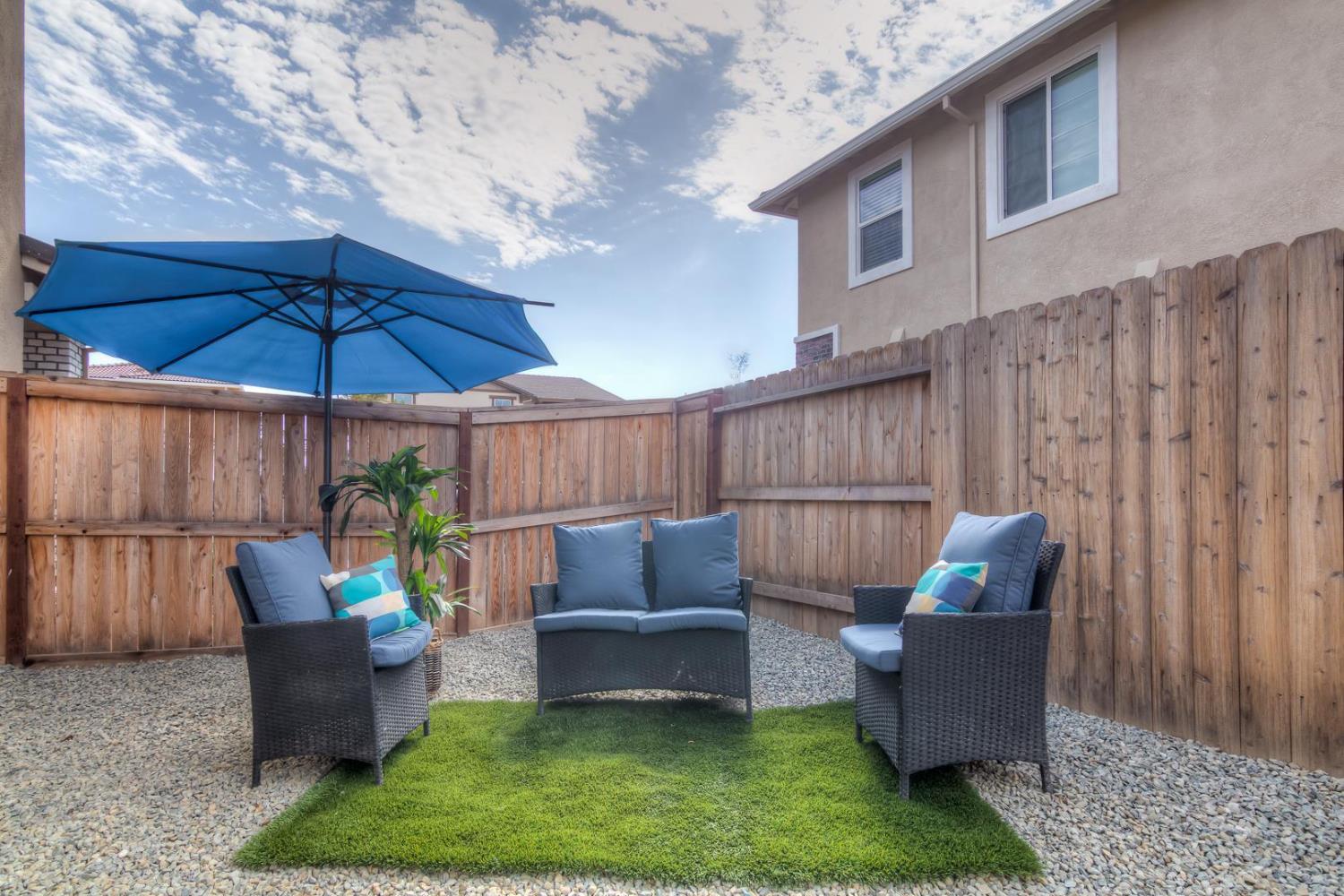 2116 Abbeyhill Road Lincoln, CA 95648 - Photo 39 of 46 a backyard of a house with table and chairs