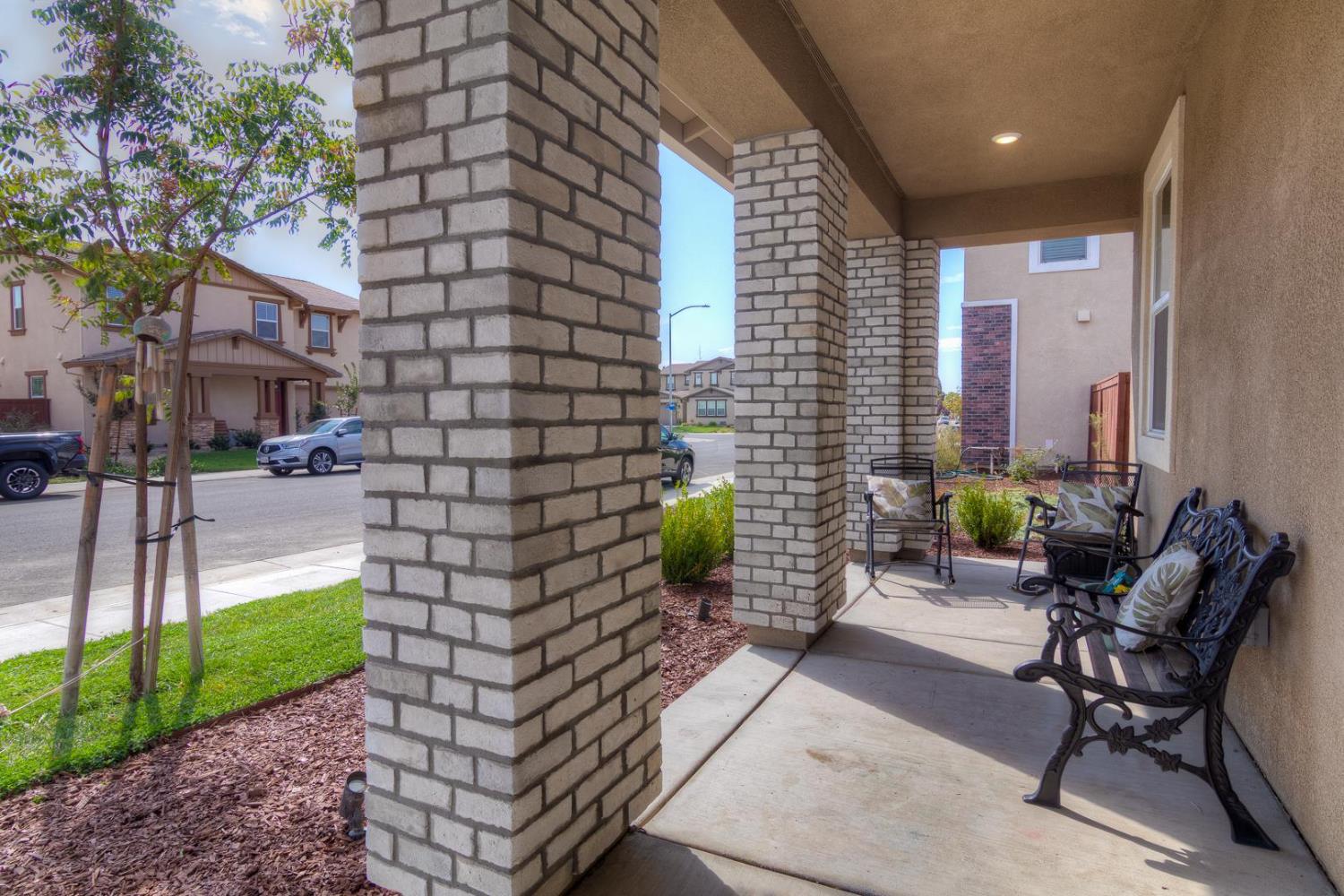 2116 Abbeyhill Road Lincoln, CA 95648 - Photo 4 of 46 a building outdoor space with patio furniture and garden