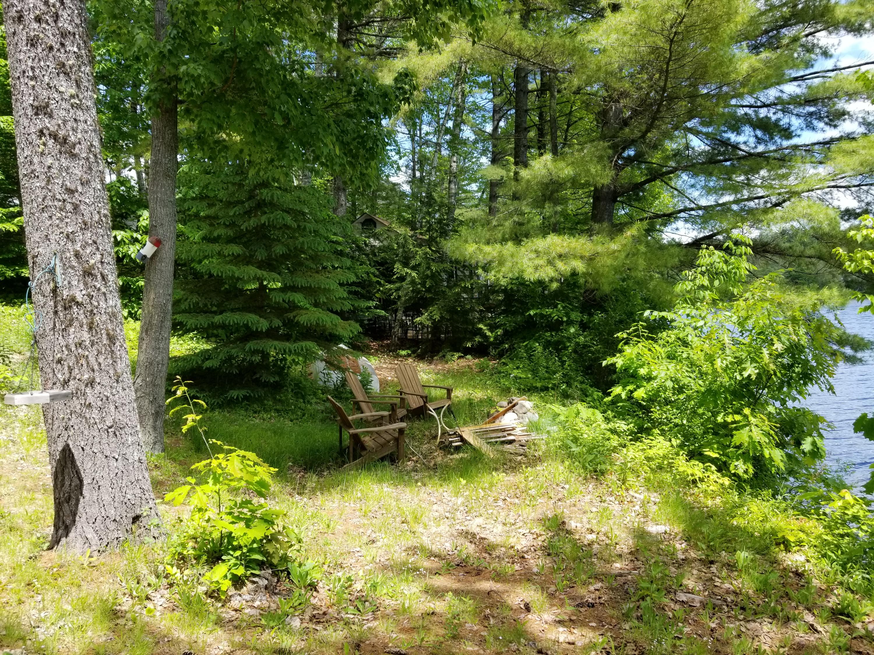 39 Lapointe Road Peru, ME 04290 - Photo 5 of 41 fire pit at waters edge