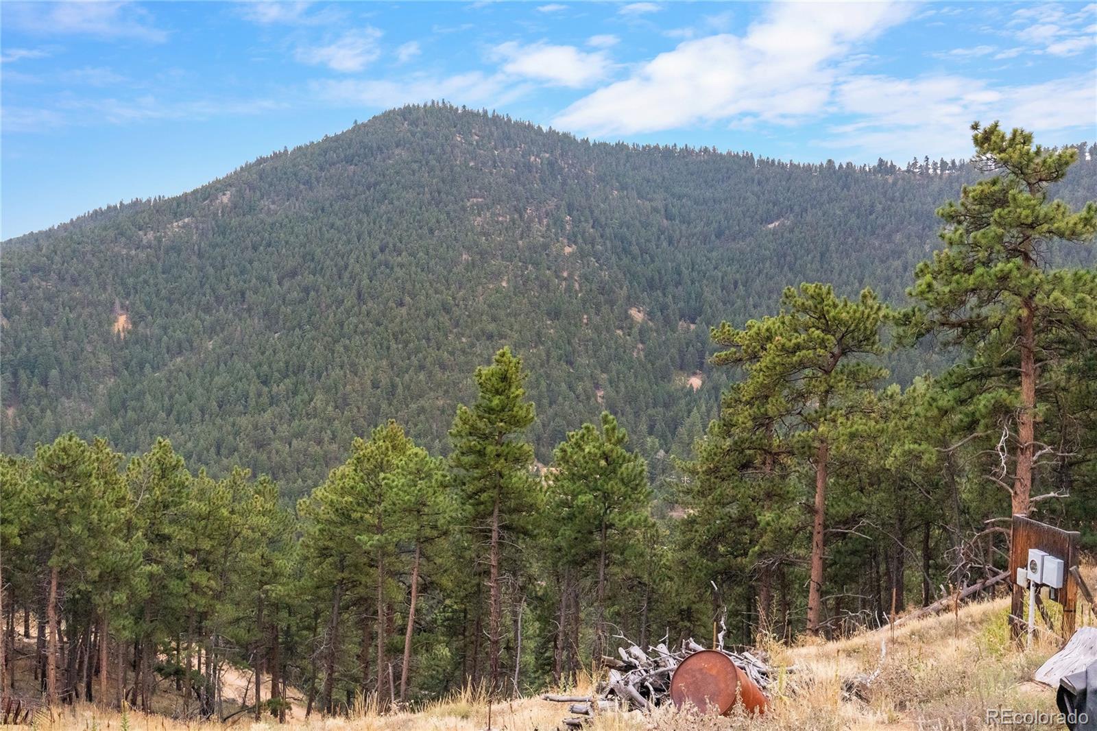 601 Escape Route Boulder, CO 80302 - Photo 11 of 17 a view of a house with a mountain