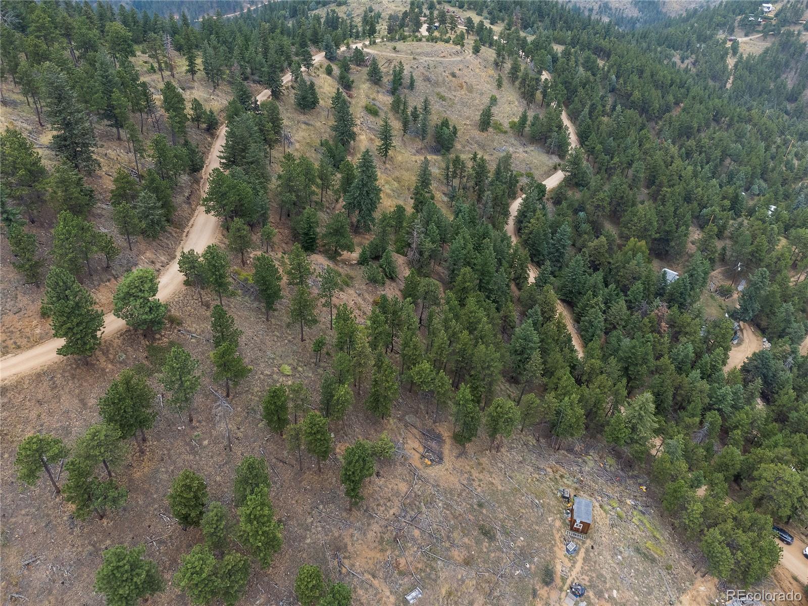 601 Escape Route Boulder, CO 80302 - Photo 13 of 17 a view of a city with lush green forest