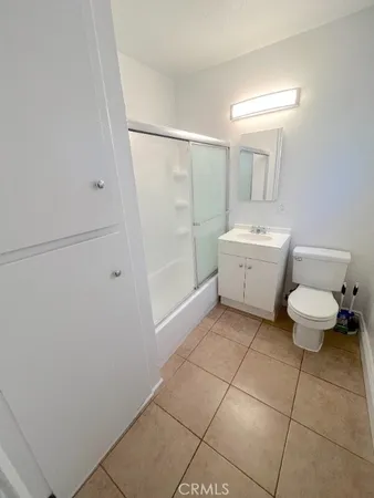 a view of bathroom with bathtub and toilet