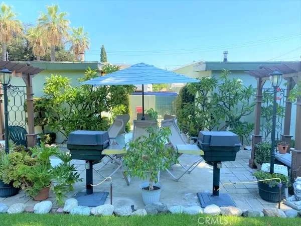 a garden view with a seating space