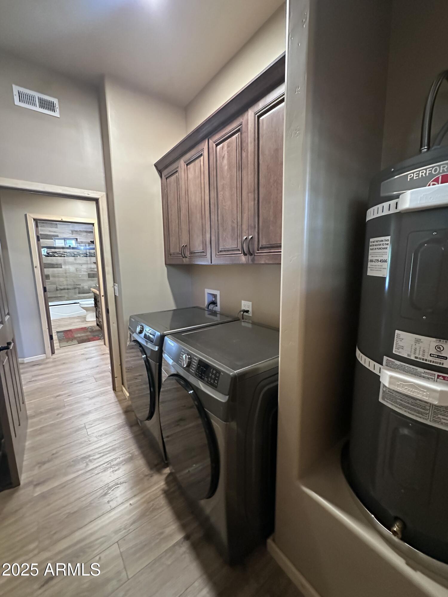 3457 Whispering Pines Road Pine, AZ 85544 - Photo 11 of 27 a kitchen with wooden floor and a sink