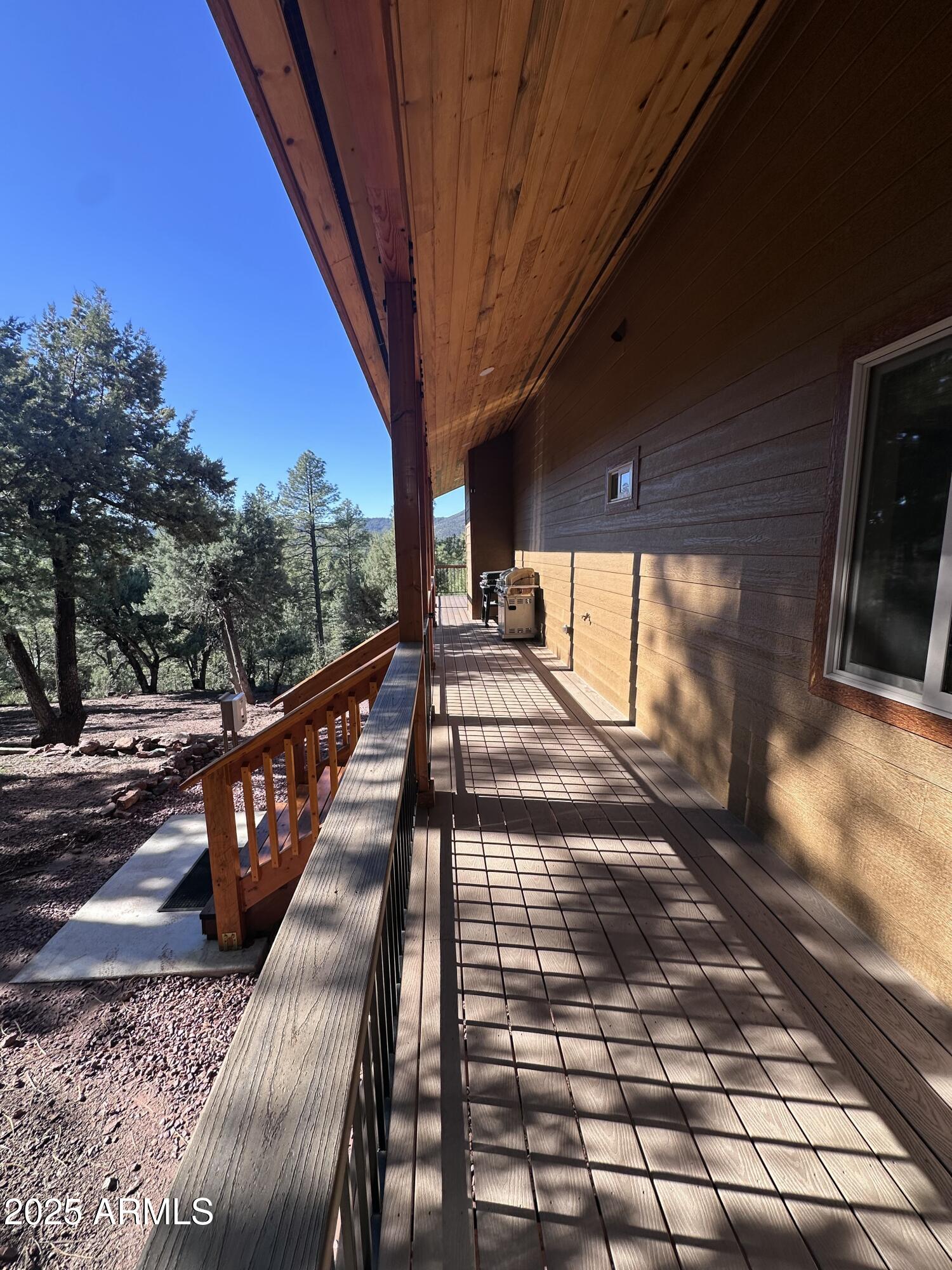 3457 Whispering Pines Road Pine, AZ 85544 - Photo 23 of 27 a view of a pathway with a balcony