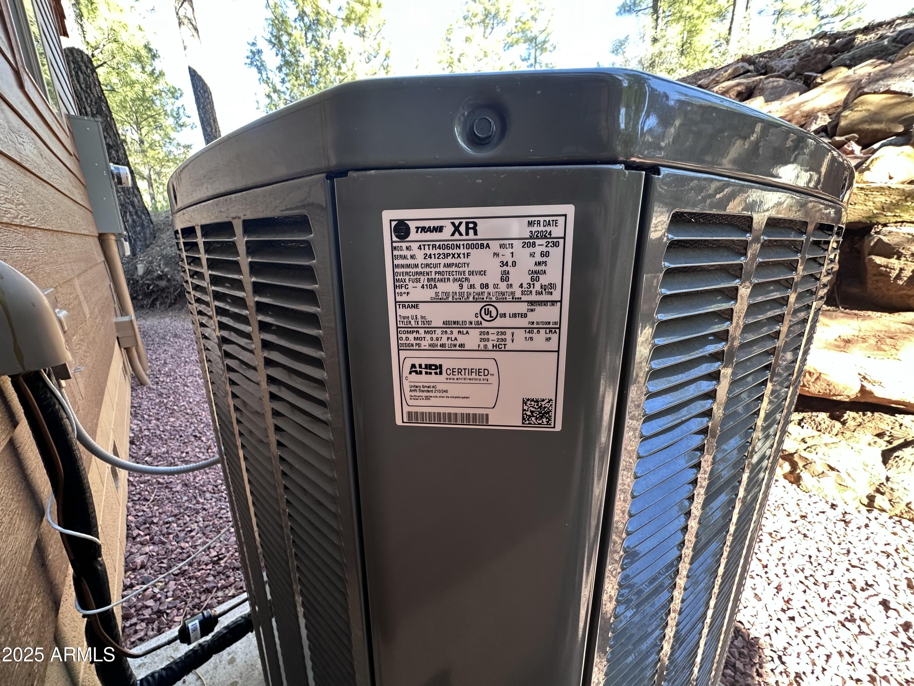 3457 Whispering Pines Road Pine, AZ 85544 - Photo 25 of 27 a front view of a house with a door