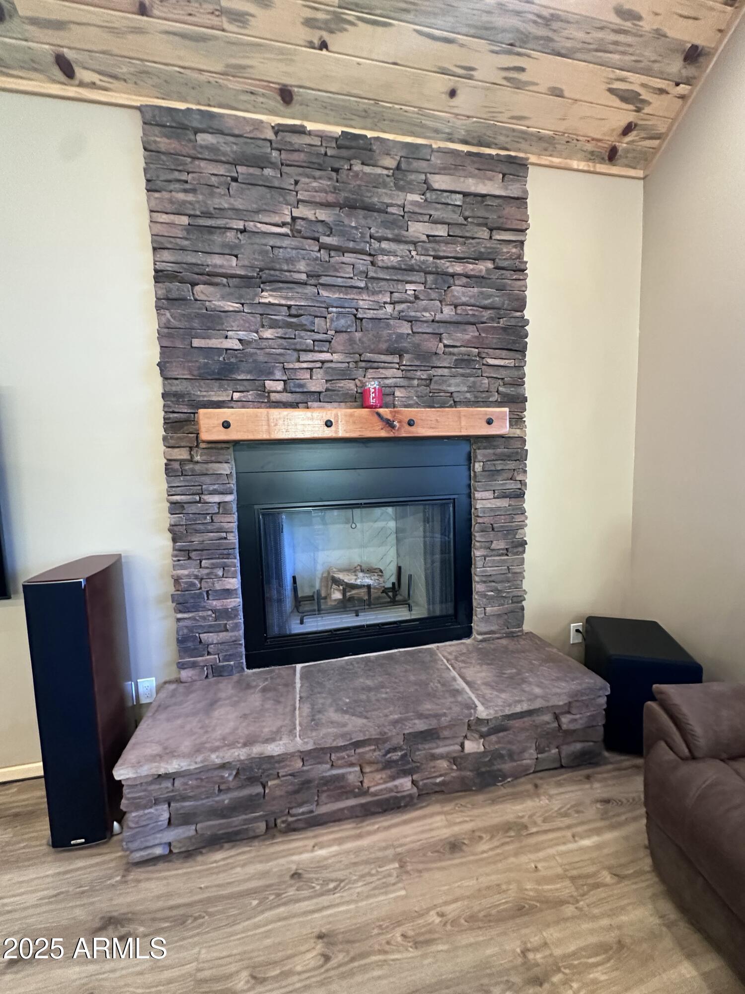 3457 Whispering Pines Road Pine, AZ 85544 - Photo 8 of 27 a living room with furniture and a fireplace