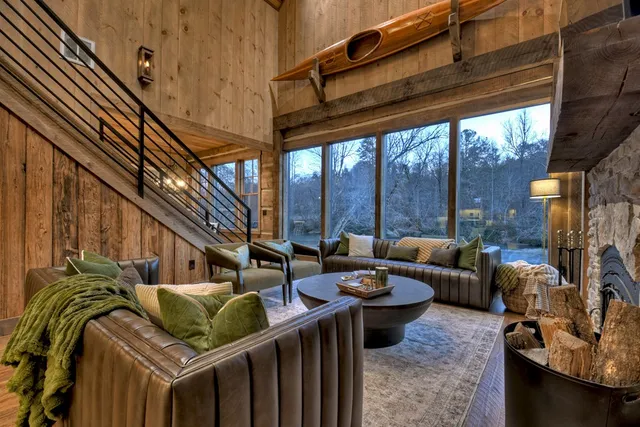 a bedroom with a bed a mirror and a window